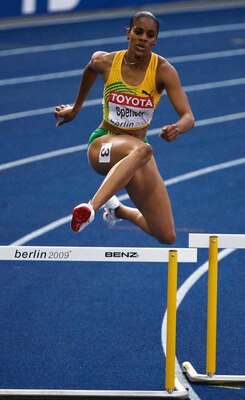 BERLIN - AUGUST 17:  Kaliese Spencer of Jamaica competes in the women's 400 Metres Hurdles Heats during day three of the 12th IAAF World Athletics Championships at the Olympic Stadium on August 17, 2009 in Berlin, Germany.  (Photo by Andy Lyons/Getty Imag