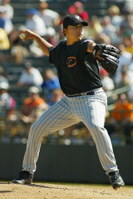 PHOENIX - MARCH 7:  Starting pitcher Russ Ortiz #48 of the Arizona Diamondbacks pitches against the Oakland Athletics during the MLB spring training game on March 7, 2005 at Phoenix Municipal Stadium in Phoenix, Arizona. The A's defeated the Diamondbacks