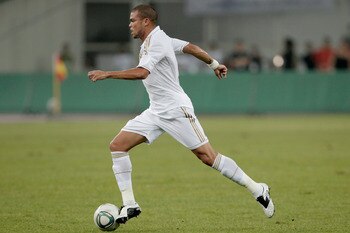 TIANJIN, CHINA - AUGUST 06:  Pepe of Real Madrid controls the ball during the pre-season friendly match between Tianjin Teda and Real Madrid at Water Drop Stadium on August 6, 2011 in Tianjin, China.  (Photo by Lintao Zhang/Getty Images)