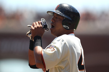 SAN FRANCISCO, CA - AUGUST 03:  Orlando Cabrera #43 of the San Francisco Giants reacts after being tagged out at third by Cody Ransom of the Arizona Diamondbacks in the second inning at AT&T Park on August 3, 2011 in San Francisco, California.  (Photo by