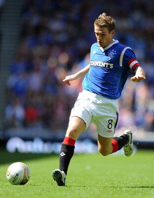 GLASGOW, SCOTLAND - JULY 23: Steven Davis of Rangers in action during the Clydesdale Bank Premier League match between Rangers and Hearts at Ibrox Stadium on July 23, 2011 in Glasgow, Scotland.  (Photo by Chris Brunskill/Getty Images)