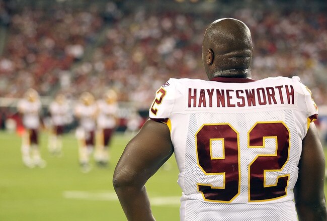 GLENDALE, AZ - SEPTEMBER 02:  Defensive tackle Albert Haynesworth #92 of the Washington Redskins stands on the sidelines during preseason NFL game against the Arizona Cardinals at the University of Phoenix Stadium on September 2, 2010 in Glendale, Arizona