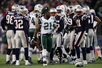 FOXBORO, MA - JANUARY 16:  Running back LaDainian Tomlinson #21 of the New York Jets walks with the ball after a play against the New England Patriots during their 2011 AFC divisional playoff game at Gillette Stadium on January 16, 2011 in Foxboro, Massac