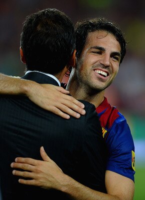 BARCELONA, SPAIN - AUGUST 17:  Cesc Fabregas of Barcelona celebrates victory in the Super Cup second leg match between Barcelona and Real Madrid at Nou Camp on August 17, 2011 in Barcelona, Spain.  (Photo by Laurence Griffiths/Getty Images)