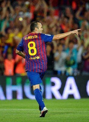 BARCELONA, SPAIN - AUGUST 17: Andres Iniesta of Barcelona celebrates his goal during the Super Cup second leg match between Barcelona and Real Madrid at Nou Camp on August 17, 2011 in Barcelona, Spain.  (Photo by Laurence Griffiths/Getty Images)