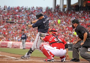CINCINNATI, OH - JULY 24:  Brian McCann #16 of the Atlanta Braves  swings at a pitch during the game against the Cincinnati Reds at Great American Ball Park at Great American Ball Park on July 24, 2011 in Cincinnati, Ohio.  (Photo by Andy Lyons/Getty Imag