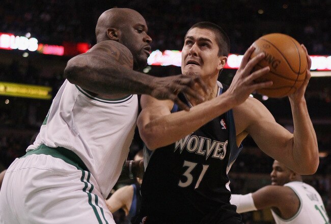 BOSTON, MA - JANUARY 03:  Darko Milicic #31 of the Minnesota Timberwolves tries to get around Shaquille O'Neal #36 of the Boston Celtics on January 3, 2011 at the TD Garden in Boston, Massachusetts. NOTE TO USER: User expressly acknowledges and agrees tha