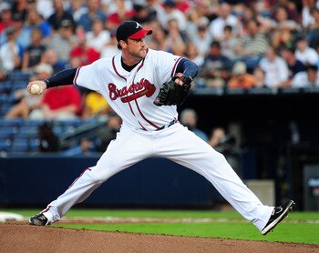 ATLANTA - AUGUST 13: Derek Lowe #32 of the Atlanta Braves pitches against the Chicago Cubs at Turner Field on August 13, 2011 in Atlanta, Georgia. (Photo by Scott Cunningham/Getty Images)