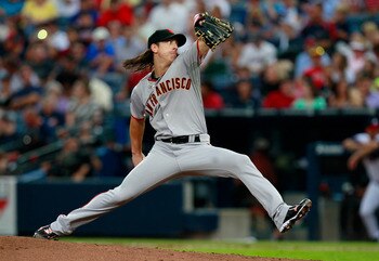 ATLANTA, GA - AUGUST 18:  Tim Lincecum #55 of the San Francisco Giants pitches to the Atlanta Braves at Turner Field on August 18, 2011 in Atlanta, Georgia.  (Photo by Kevin C. Cox/Getty Images)