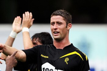 LONDON, ENGLAND - AUGUST 13:  Gary Cahill of Bolton congratulates teammates after the Barclays Premier League match between Queens Park Rangers and Bolton Wanderers at Loftus Road on August 13, 2011 in London, England.  (Photo by Michael Steele/Getty Imag
