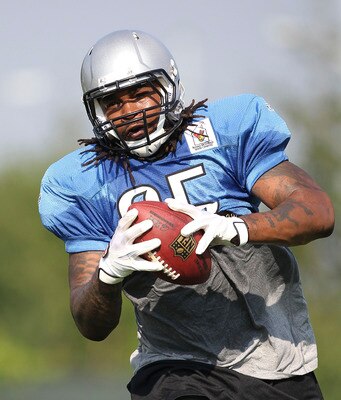 ALLEN PARK, MI - AUGUST 01:  Mikel Leshoure #25 of the Detroit Lions go through the daily practice session at the Lions training facility on August 1, 2011 in Allen Park, Michigan.  (Photo by Leon Halip/Getty Images)