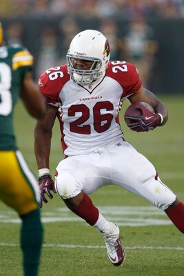 GREEN BAY, WI - AUGUST 19: Beanie Wells #26 of the Arizona Cardinals runs with the football against the Green Bay Packers in a preseason game at Lambeau Field on August 19, 2011 in Green Bay, Wisconsin. (Photo by Scott Boehm/Getty Images)