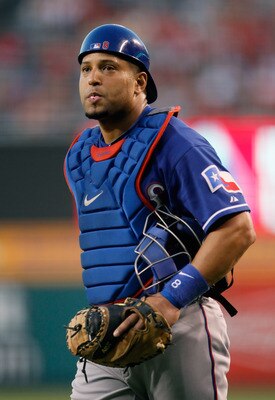 ANAHEIM, CA - AUGUST 17:  Catcher Yorvit Torrealba #8 of the Texas Rangers looks on against the Los Angeles Angels of Anaheim at Angel Stadium of Anaheim on August 17, 2011 in Anaheim, California.  (Photo by Jeff Gross/Getty Images)
