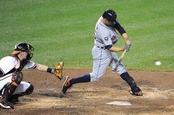 BALTIMORE, MD - AUGUST 13:  Ryan Raburn #25 of the Detroit Tigers drives in the winning runs with a single in the sixth inning against the Baltimore Orioles at Oriole Park at Camden Yards on August 13, 2011 in Baltimore, Maryland. Detroit won the game 6-5