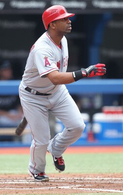 TORONTO,CANADA - AUGUST 13:  Alberto Callaspo #6 of the Los Angeles Angels of Anaheim bats against the Toronto Blue Jays in a MLB game on August 13,2011 at the Rogers Centre in Toronto, Canada. (Photo by Claus Andersen/Getty Images)