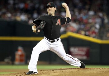 PHOENIX, AZ - AUGUST 06:  Starting pitcher Joe Saunders #34 of the Arizona Diamondbacks pitches against the Los Angeles Dodgers during the Major League Baseball game at Chase Field on August 6, 2011 in Phoenix, Arizona. The Dodgers defeated the Diamondbac