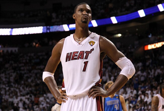 MIAMI, FL - JUNE 12:  Chris Bosh #1 of the Miami Heat looks on late in the fourth quarter while taking on the Dallas Mavericks in Game Six of the 2011 NBA Finals at American Airlines Arena on June 12, 2011 in Miami, Florida. NOTE TO USER: User expressly a
