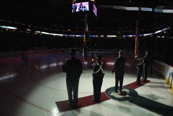 DENVER - NOVEMBER 19:  General view of the arena as Jake Schroeder sings the national anthem as the Colorado Avalanche face the New York Rangers at the Pepsi Center on November 19, 2010 in Denver, Colorado. The Avalanche defeated the Rangers 5-1.  (Photo
