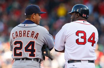 BOSTON - APRIL 8:  David Ortiz #34 of the Boston Red Sox chats with Miguel Cabrera #24 of the Detroit Tigers during a pitching change on April 8, 2008 at Fenway Park in Boston, Massachusetts. The Red Sox defeated the Tigers 5-0.  (Photo by Jim Rogash/Gett