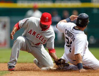 DETROIT - MAY 1: Miguel Cabrera #24 of the Detroit Tigers steals second base in the third inning as Erick Aybar #2 the Los Angeles Angels of Anaheim makes the late tag during the game on May 1, 2010 at Comerica Park in Detroit, Michigan. The Tigers defeat