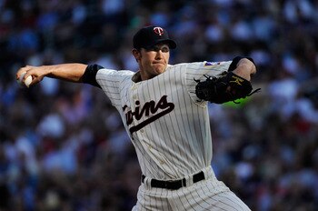 MINNEAPOLIS, MN - AUGUST 8: Scott Baker #30 of the Minnesota Twins delivers a pitch Boston Red Sox in the first inning on August 8, 2011 at Target Field in Minneapolis, Minnesota. (Photo by Hannah Foslien/Getty Images)