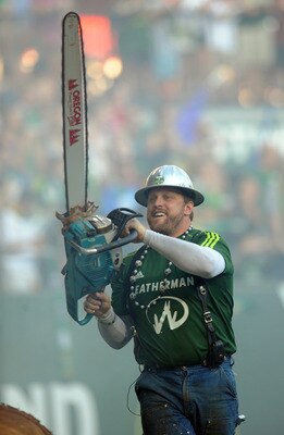 PORTLAND, OR - AUGUST 20: 'Timber Joey,' the mascot of the Portland Timbers, fires up his chainsaw after the Timbers scored a goal during the first half of the game against Vancouver FC at Jeld-Wen Field on August 20, 2011 in Portland, Oregon. The Timbers