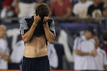 FOXBORO, MA - AUGUST 20:  Pat Phelan #28 of the New England Revolution reacts after earning a tie against the New York Red Bulls at Gillette Stadium on August 20, 2011 in Foxboro, Massachusetts. The Revolution has to settle for a tie after the team had a 