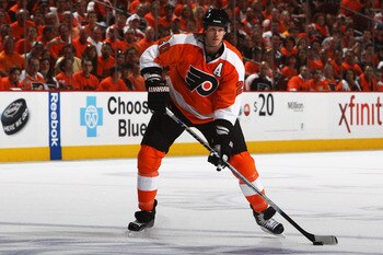 PHILADELPHIA, PA - APRIL 26:  Chris Pronger #20 of the Philadelphia Flyers controls the puck against the Buffalo Sabres in Game Seven of the Eastern Conference Quarterfinals during the 2011 NHL Stanley Cup Playoffs at Wells Fargo Center on April 26, 2011