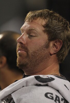 CHICAGO, IL - AUGUST 14: Adam Dunn #32 of the Chicago White Sox sits in the dugout during a game against the Texas Rangers at U.S. Cellular Field on August 19, 2011 in Chicago, Illinois. The Rangers defeated the White Sox 7-4. (Photo by Jonathan Daniel/Ge
