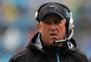 CHARLOTTE, NC - SEPTEMBER 26:  Head coach John Fox of the Carolina Panthers watches on in the rain against the Cincinnati Bengals during their game at Bank of America Stadium on September 26, 2010 in Charlotte, North Carolina.  (Photo by Streeter Lecka/Ge