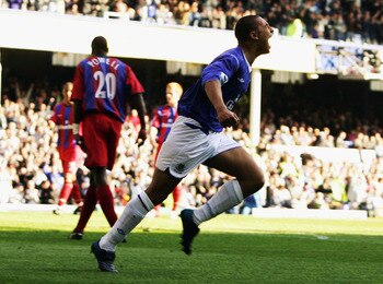 LIVERPOOL, ENGLAND - APRIL 10:  James Vaughan of Everton celebrates scoring their fourth goal on his debut during the Barclays Premiership match between Everton and Crystal Palace at Goodison Park on April 10, 2005 in Liverpool, England. (Photo by Christo