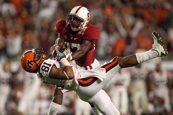 MIAMI, FL - JANUARY 03: Jarrett Boykin #81 of the Virginia Tech Hokies makes a recption in the seocnd quarter against Johnson Bademosi #27 of the Stanford Cardinal during the 2011 Discover Orange Bowl at Sun Life Stadium on January 3, 2011 in Miami, Flori