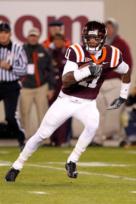 BLACKSBURG, VA - NOVEMBER 04:  Wide receiver Dyrell Roberts #11 of the Virginia Tech Hokies runs with the ball against the Georgia Tech Yellow Jackets at Lane Stadium on November 4, 2010 in Blacksburg, Virginia.  (Photo by Geoff Burke/Getty Images)