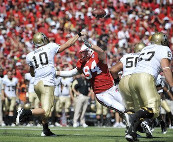 LINCOLN, NEBRASKA - SEPTEMBER 11: Idaho Vandals quarterback Nathan Enderle #10 throws a pass down field over Nebraska Cornhuskers defensive tackle Jared Crick #94 during second half action of their game at Memorial Stadium on September 4, 2010 in Lincoln,