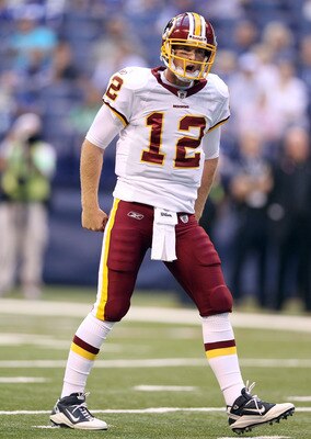 INDIANAPOLIS, IN - AUGUST 19:  John Beck #12 of the Washington Redskins celebrates a touchdown during the game against Indianapolis Colts at Lucas Oil Stadium on August 19, 2011 in Indianapolis, Indiana.  (Photo by Andy Lyons/Getty Images)