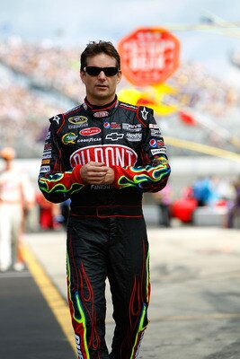 BROOKLYN, MI - AUGUST 21:  Jeff Gordon, driver of the #24 DuPont Chevrolet, walks on the grid  during the NASCAR Sprint Cup Series Pure Michigan 400 at Michigan International Speedway on August 21, 2011 in Brooklyn, Michigan.  (Photo by Wesley Hitt/Getty