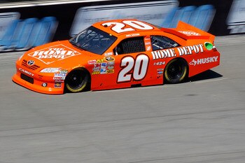 BROOKLYN, MI - AUGUST 19: Joey Logano drives the #20 The Home Depot Toyota during practice for the NASCAR Sprint Cup Series Pure Michigan 400 at Michigan International Speedway on August 19, 2011 in Brooklyn, Michigan.  (Photo by Geoff Burke/Getty Images