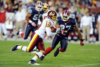LANDOVER, MD - AUGUST 13:  Bobby Wade #19 of the Washington Redskins is tackled during the preseason game by Reggie Corner #27 of the Buffalo Bills at FedEx Field on August 13, 2010 in Landover, Maryland.  (Photo by Greg Fiume/Getty Images)