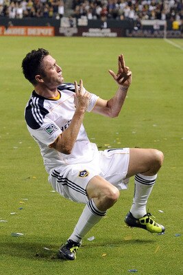 CARSON, CA - AUGUST 20:  Robbie Keane #14 of the Los Angeles Galaxy celebrates his goal in his debut game for a 1-0 lead over the San Jose Earthquakes during the first half at The Home Depot Center on August 20, 2011 in Carson, California.  (Photo by Harr