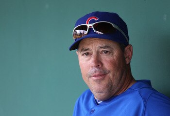 SCOTTSDALE, AZ - MARCH 01:  Greg Maddux of the Chicago Cubs sits in the dugout before the spring training game against the San Francisco Giants at Scottsdale Stadium on March 1, 2011 in Scottsdale, Arizona.  (Photo by Christian Petersen/Getty Images)
