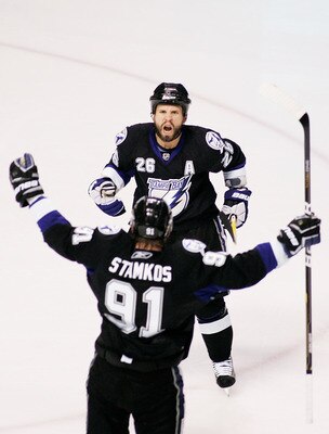 TAMPA, FL - MAY 25:  Martin St. Louis #26 celebrates his second period goal with Steven Stamkos #91 of the Tampa Bay Lightning in Game Six of the Eastern Conference Finals against the Boston Bruins during the 2011 NHL Stanley Cup Playoffs at St Pete Times