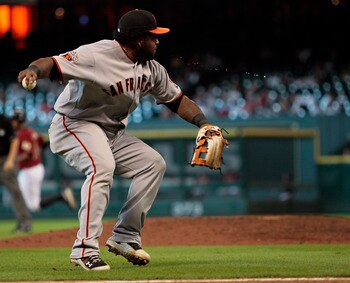 HOUSTON - AUGUST 21:  Third baseman Pablo Sandoval #48 of the San Francisco Giants throws out Jose Altuve #27 of the Houston Astros after a sacrifice bunt inthe ninth inning at Minute Maid Park on August 21, 2011 in Houston, Texas.  (Photo by Bob Levey/Ge