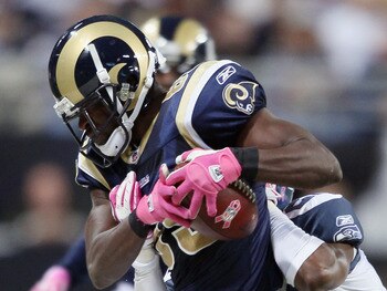 ST. LOUIS - OCTOBER 03:  Mark Clayton #89 of the St. Louis Rams makes the catch as Kelly Jennings #21 of the Seattle Seahawks defends on October 3, 2010 at Edward Jones Dome in St. Louis, Missouri. The Rams defeated the Seahawks 20-3.  (Photo by Elsa/Gett