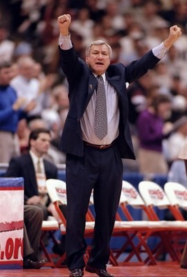 23 Mar 1997:  Head coach Dean Smith of the North Carolina Tar Heels gestures from the sidelines during an NCAA East Regional semifinal game against the Louisville Cardinals at the Carrier Dome in Syracuse, New York.  North Carolina won the game 97-74. Man