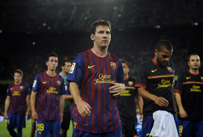 BARCELONA, SPAIN - AUGUST 22:  Lionel Messi of FC Barcelona leaves the pitch at the end of the Joan Gamper Trophy match between FC Barcelona and SSC Napoli at the Camp Nou Stadium on August 22, 2011 in Barcelona, Spain.  (Photo by David Ramos/Getty Images