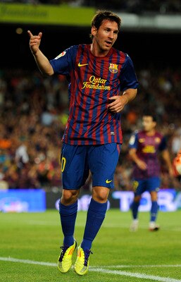 BARCELONA, SPAIN - AUGUST 22:  Lionel Messi of FC Barcelona celebrates after scoring his fifth team's goal during the Joan Gamper Trophy match between FC Barcelona and SSC Napoli at the Camp Nou Stadium on August 22, 2011 in Barcelona, Spain.  (Photo by D