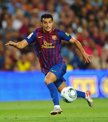 BARCELONA, SPAIN - AUGUST 17: Pedro of Barcelona in action during the Super Cup second leg match between Barcelona and Real Madrid at Nou Camp on August 17, 2011 in Barcelona, Spain.  (Photo by Laurence Griffiths/Getty Images)