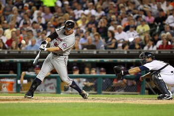 DETROIT, MI - AUGUST 15: DH, Jim Thome #25 of the Minnesota Twins hits his second home run of the game in the seventh inning and his 600th career home run making him only the eighth player in Major League Baseball history to achieve that milestone during