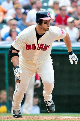 CLEVELAND, OH - JULY 24: Designated hitter Travis Hafner #48 of the Cleveland Indians watches an RBI single during the sixth inning against the Cleveland Indians at Progressive Field on July 24, 2011 in Cleveland, Ohio. (Photo by Jason Miller/Getty Images