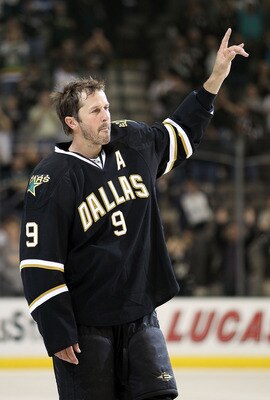 DALLAS - APRIL 08:  Center Mike Modano #9 of the Dallas Stars waves to the crowd after his last home game of the season against the Anaheim Ducks at American Airlines Center on April 8, 2010 in Dallas, Texas.  (Photo by Ronald Martinez/Getty Images)